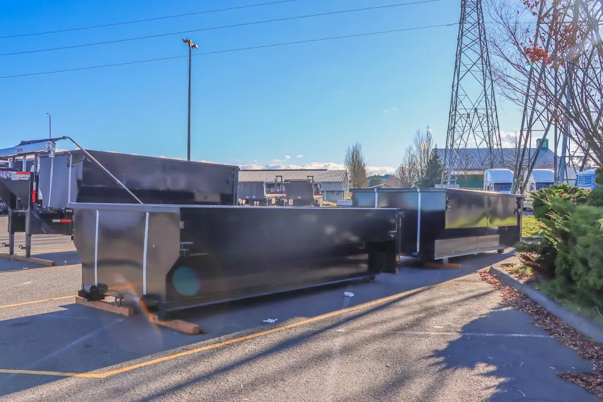Roll-off dumpster ready for waste disposal at job site for 2 Yard Dumpster Rental in Washington